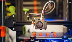 How 3D Printing Is Changing The Jewelry Industry? 3D printer producing a piece of jewelry