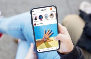 How to monitor your kid’s Instagram Messages? Parent checking a child’s Instagram messages on a phone