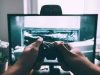8 Remarkable Multiplayer Smartphone Games of 2023 Friends playing a multiplayer game on smartphones