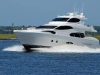 How to Retain the Brand New Look of Your Yacht? Crew polishing the hull of a luxury yacht