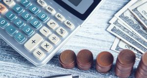 Understanding Your Trading Costs in Forex Forex trading charts displayed on a monitor
